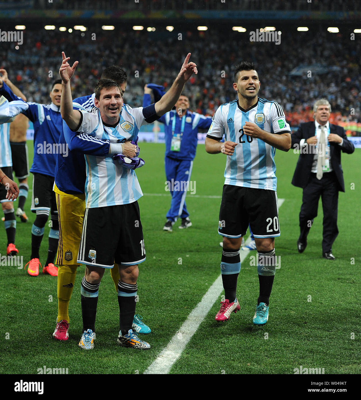 Lionel Messi (L) of Argentina celebrates at full-time following the 2014 FIFA World Cup Semi Final match at the Arena Corinthians in Sao Paulo, Brazil on July 09, 2014. UPI/Chris Brunskill Stock Photo