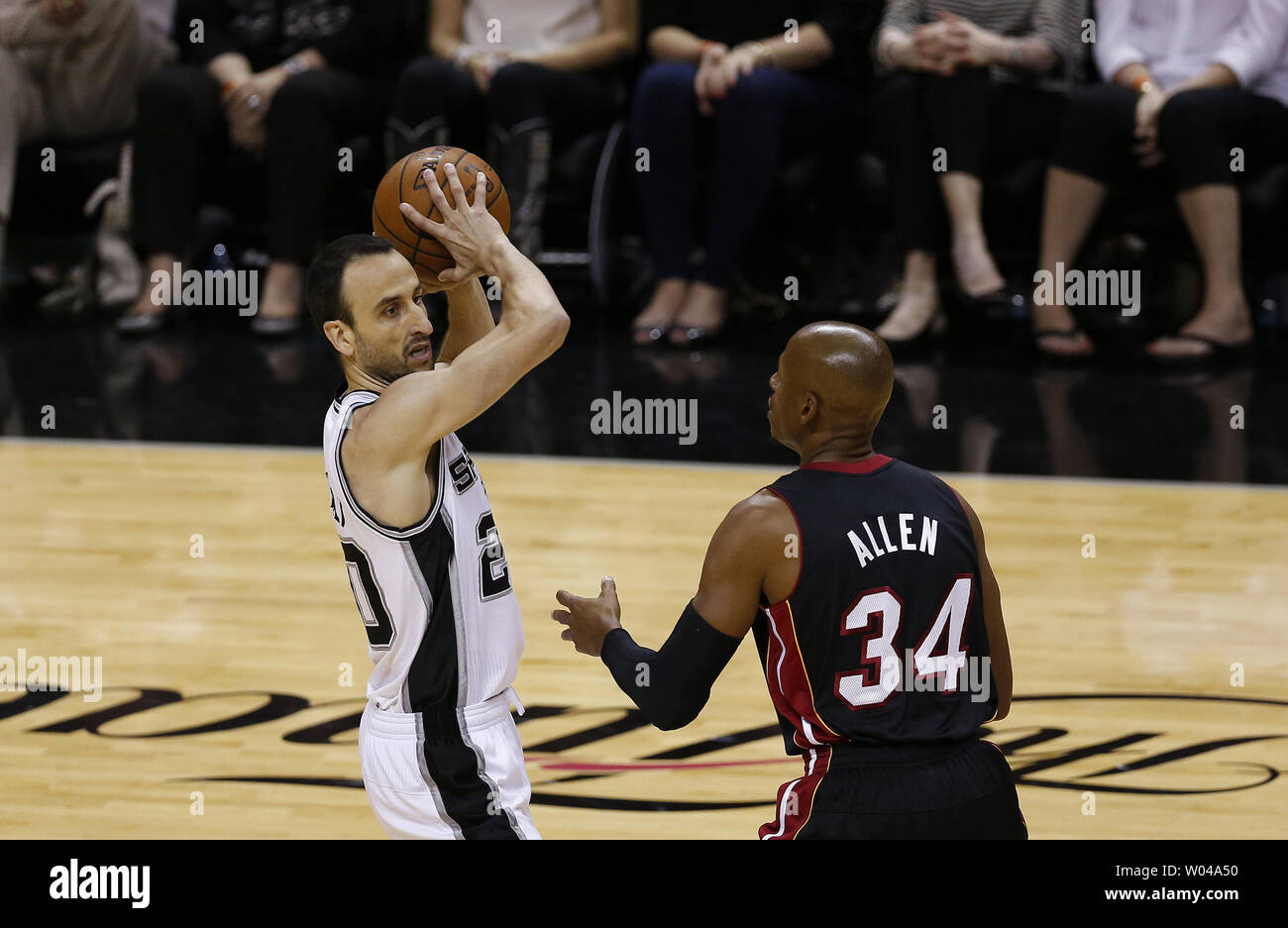 Miami Heat guard Ray Allen (34) defends against San Antonio Spurs guard Manu Ginobili (20) in game 2 of the NBA Finals at the AT&T Center in San Antonio, Texas on June 8, 2014. The Heat defeated the Spurs 98-96 to tie the series at 1-1 in the best of seven series.     UPI/Aaron M. Sprecher Stock Photo