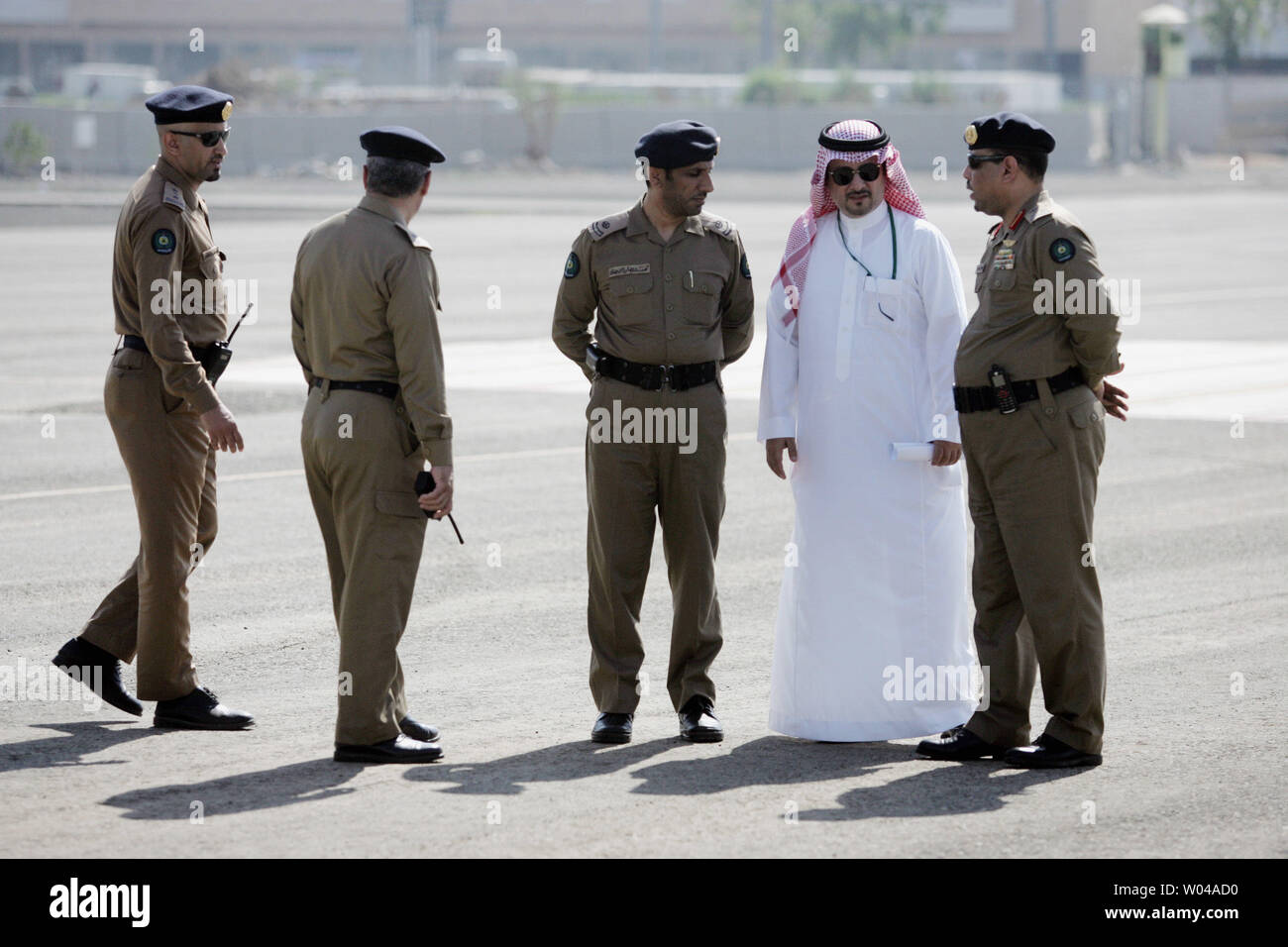 Saudi security officers talk together in Mina valley,near Mecca, Saudi