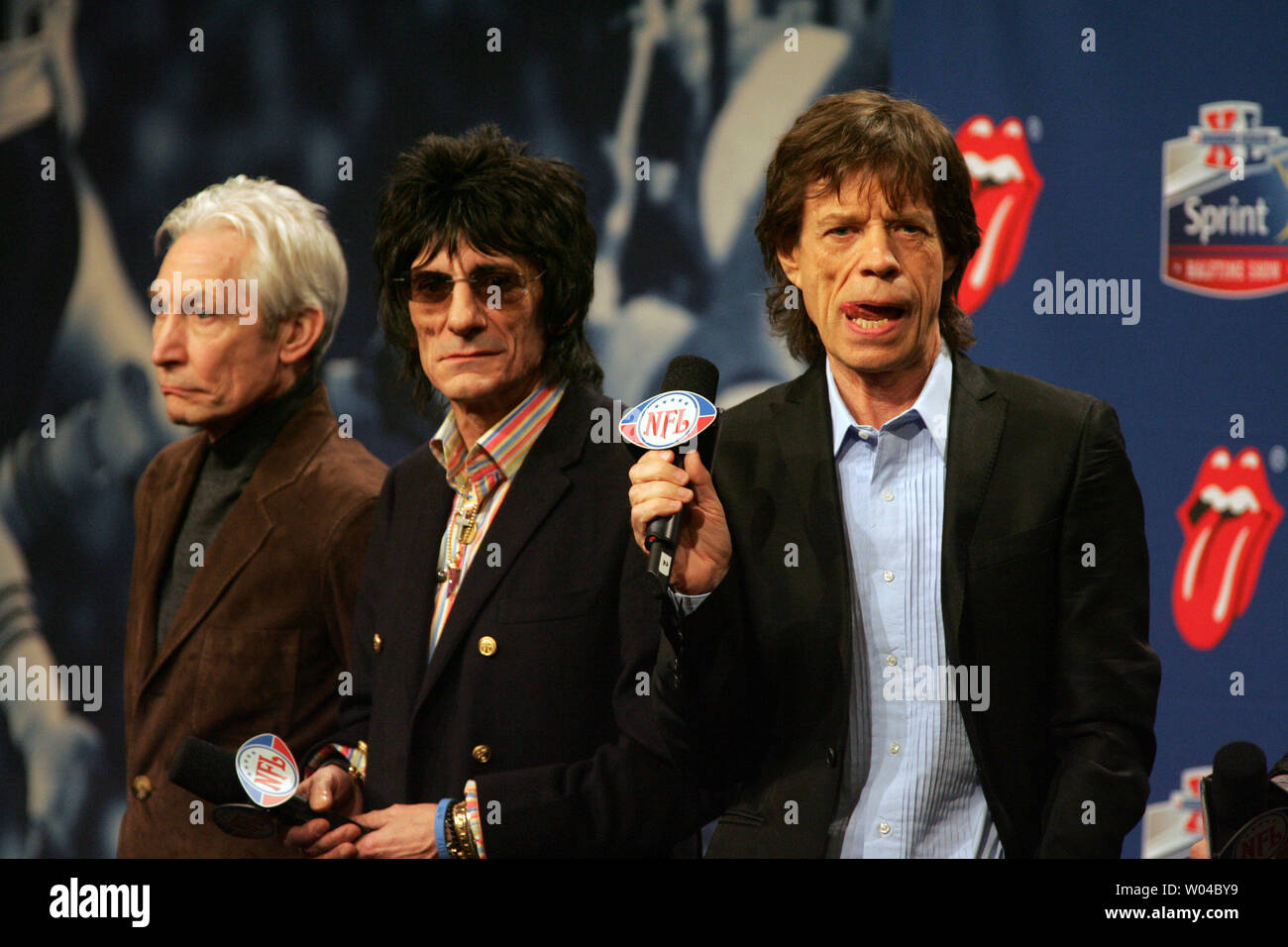 The Rolling Stones (L to R) Charlie Watts, Ron Wood, and Mick Jagger participate in a news conference discussing the half-time entertainment for Super Bowl XL on February 2, 2006, in Detroit, Mi. Super Bowl XL will feature the Pittsburgh Steelers and the Seattle Seahawks on February 5.   (UPI Photo/Terry Schmitt) Stock Photo