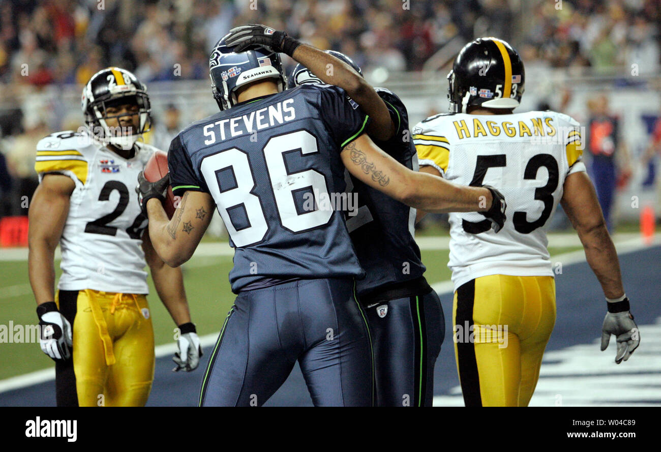 Seattle Seahawks tight end Jerramy Stevens celebrates a touchdown with teammate Darrell Jackson in the second half of Super Bowl XL featuring the Seattle Seahawks and the Pittsburgh Steelers at Ford Field in Detroit, Mi., on February 5, 2006.  (UPI Photo/Brian Kersey) Stock Photo