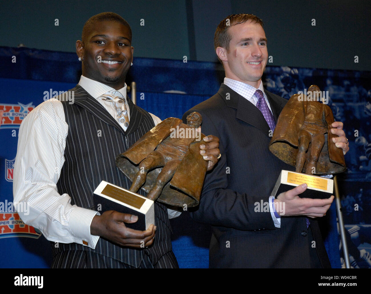 San Diego Chargers running back LaDainian Tomlinson (L) and New Orleans Saints quarter back Drew Brees pose with their Walter Peyton Man of the Year awards during the week of Super Bowl XLI in South Beach, Florida, on February 1, 2007.    (UPI Photo/Marino-Cantrell) Stock Photo