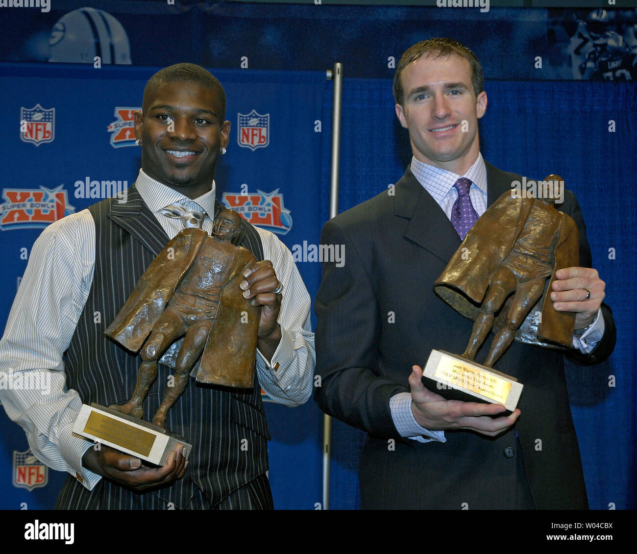 San Diego Chargers running back LaDainian Tomlinson and New Orleans Saints quarterback Drew Brees hold their Walter Payton Awards following a Super Bowl XLI press briefing in Miami on February 2, 2007. (UPI Photo-Joe Marino/Bill Cantrell) Stock Photo