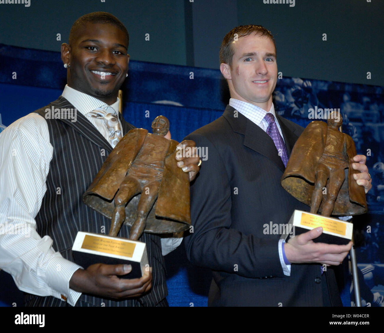 San Diego Chargers running back LaDainian Tomlinson (L) and New Orleans Saints quarter back Drew Brees pose with their Walter Peyton Man of the Year awards during the week of Super Bowl XLI in South Beach, Florida, on February 1, 2007.    (UPI Photo/Marino-Cantrell) Stock Photo