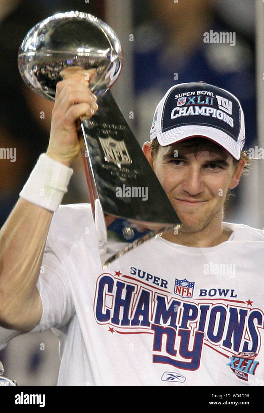 New York Giants MVP quarterback Eli Manning holds the Vince Lombardi Trophy  after defeating the New England Patriots 17-14 in Super Bowl XLII at  University of Phoenix Stadium in Glendale, Arizona on