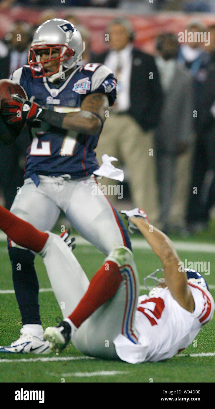 New York Giants Quarterback Eli Manning is picked off by New England Patriots Ellis Hobbs III as receiver Steve Smith lies on the ground in the second quarter of Super Bowl XLII in Glendale, Arizona, on February 3, 2008.    (UPI Photo/Gary C. Caskey) Stock Photo