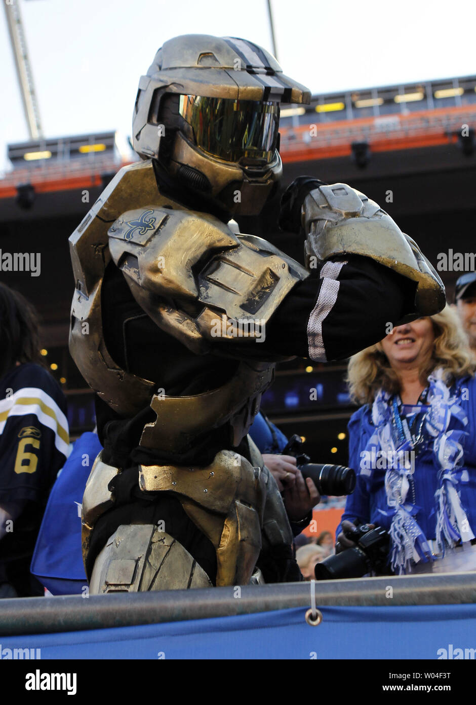 A New Orleans Saints fan dressed up like the Monday Night Football Robot  flexes prior to Super Bowl XLIV between the Indianapolis Colts and New  Orleans Saints at Sun Life Stadium in