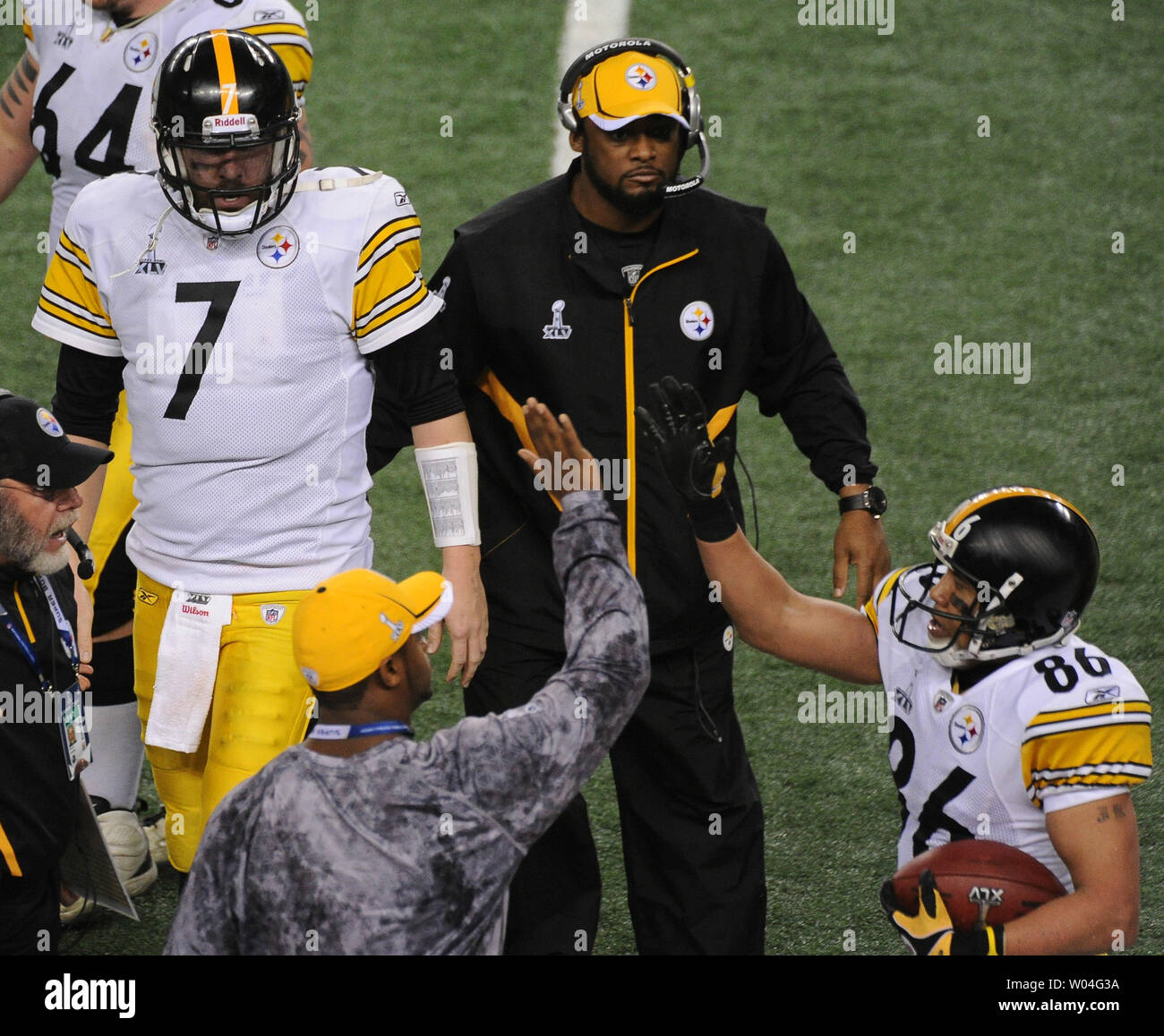 Pittsburgh Steelers Head Coach Mike Tomlin pats Pittsburgh Steelers quarterback Ben Roethlisberger on the back and goes to congratulate wide receiver Hines Ward Ward caught a second quarter touchdown pass against the Green Bay Packers during Super Bowl XLV at Cowboys Stadium in Arlington, Texas on February 6, 2011.    UPI/Jon Soohoo Stock Photo