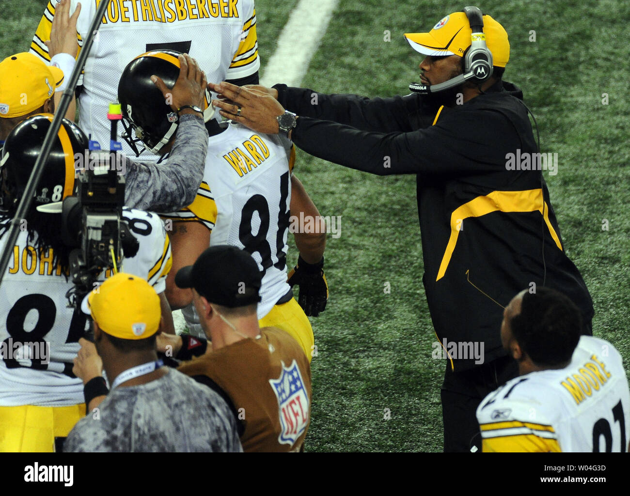 Pittsburgh Steelers Head Coach Mike Tomlin congratulates Pittsburgh Steelers wide receiver Hines Ward after Ward's second quarter touchdown against the Green Bay Packers during Super Bowl XLV at Cowboys Stadium in Arlington, Texas on February 6, 2011.    UPI/Jon Soohoo Stock Photo