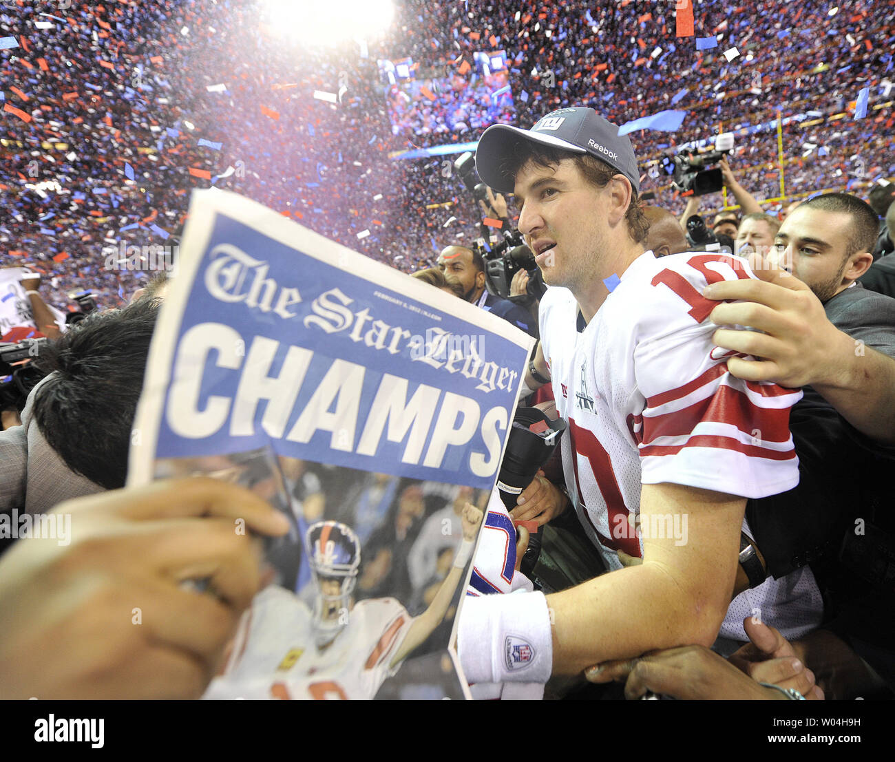 Confetti showers New York Giants quarterback Eli Manning at Super Bowl XLVI  at Lucas Oil Stadium on February 5, 2012 in Indianapolis. New York beat New  England 21-17 to win Super Bowl