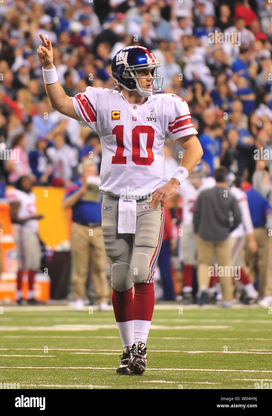 New York Giants quarterback Eli Manning goes for two points after leading  the Giants on game winning drive against the New England Patriots late in  the fourth quarter at Super Bowl XLVI