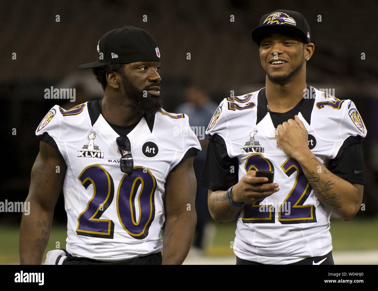 Baltimore Ravens safety Ed Reed (22) and cornerback Jimmy Smith arrive for Super  Bowl XLVII Media Day at the Mercedes-Benz Superdome in New Orleans on  January 29, 2013. The Ravens will play