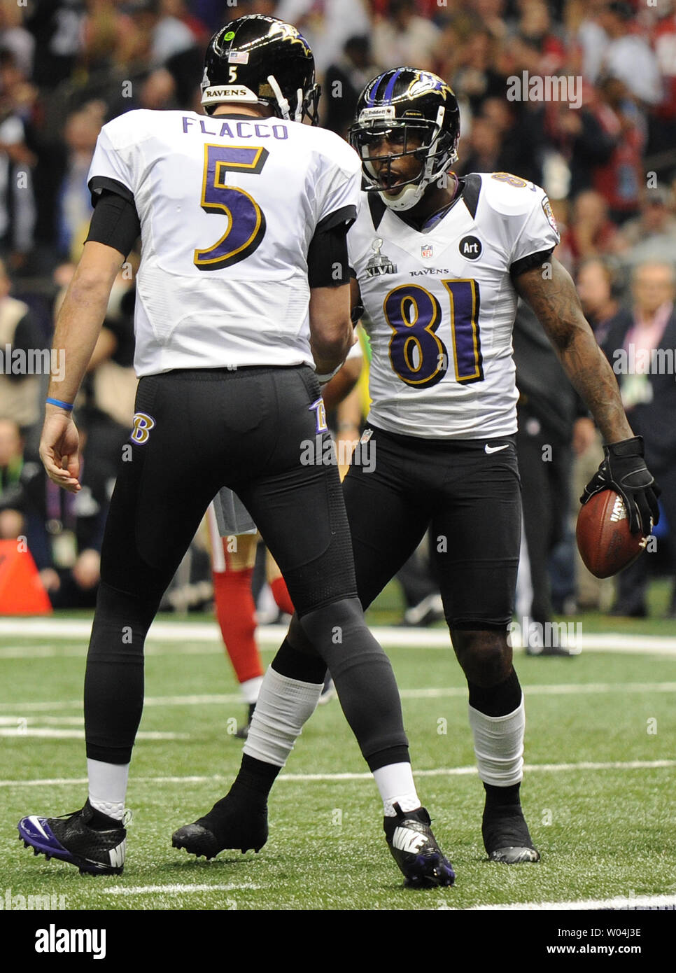 Baltimore Ravens Quarterback Joe Flacco Congratulates Wide Receiver Anquan Boldin 81 On His 13 Yard Touchdown Pass Reception Against The San Francisco 49ers During The First Quarter Of Super Bowl Xlvii At The Baltimore Ravens Quarterback Joe Flacco Congratulates Wide Receiver Anquan Boldin 81 On His 13 Yard Touchdown Pass Reception Against The San Francisco 49ers During The First Quarter Of Super Bowl Xlvii At The