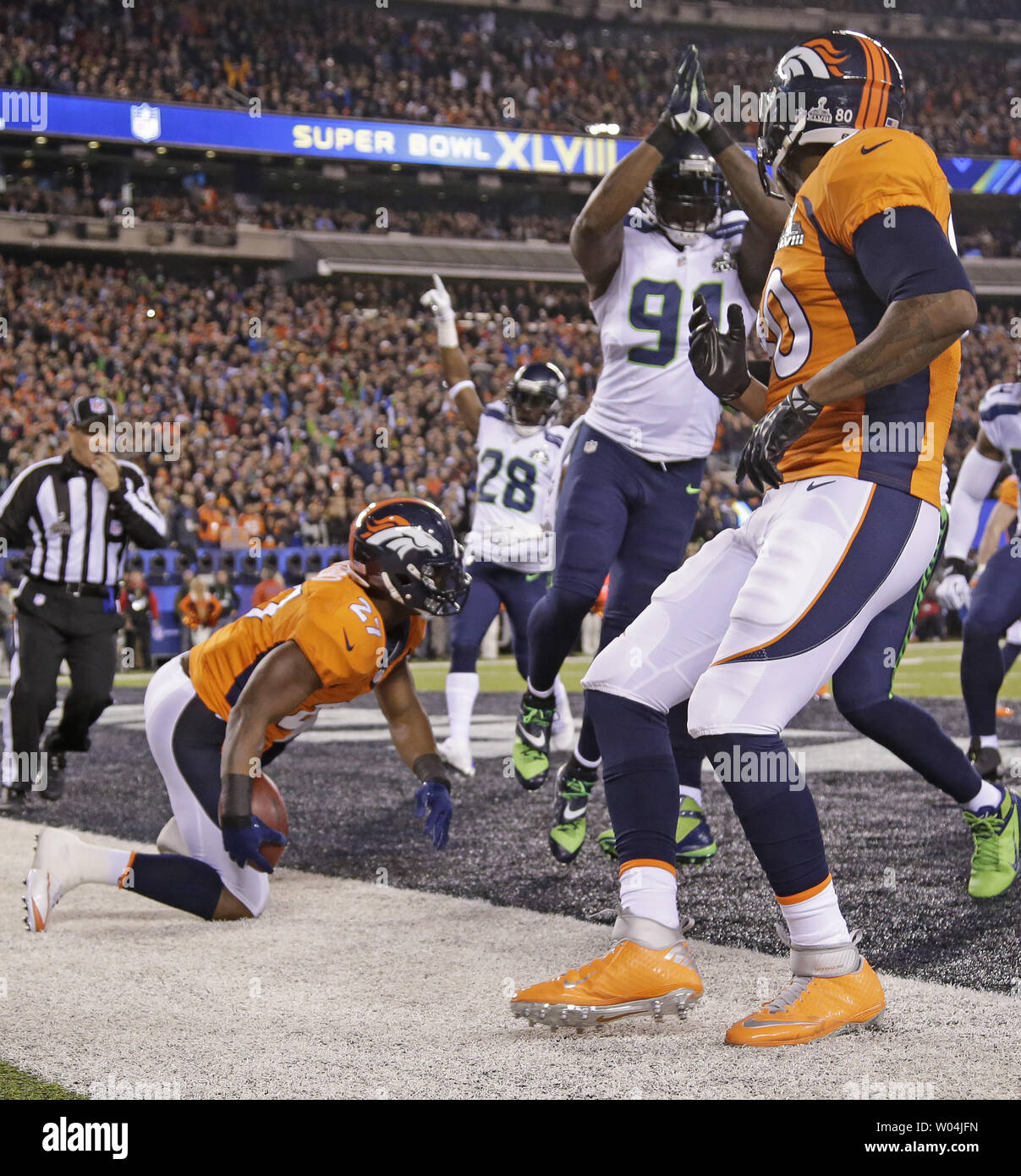 The Seattle Seahawks celebrate scoring a safety against the Denver
