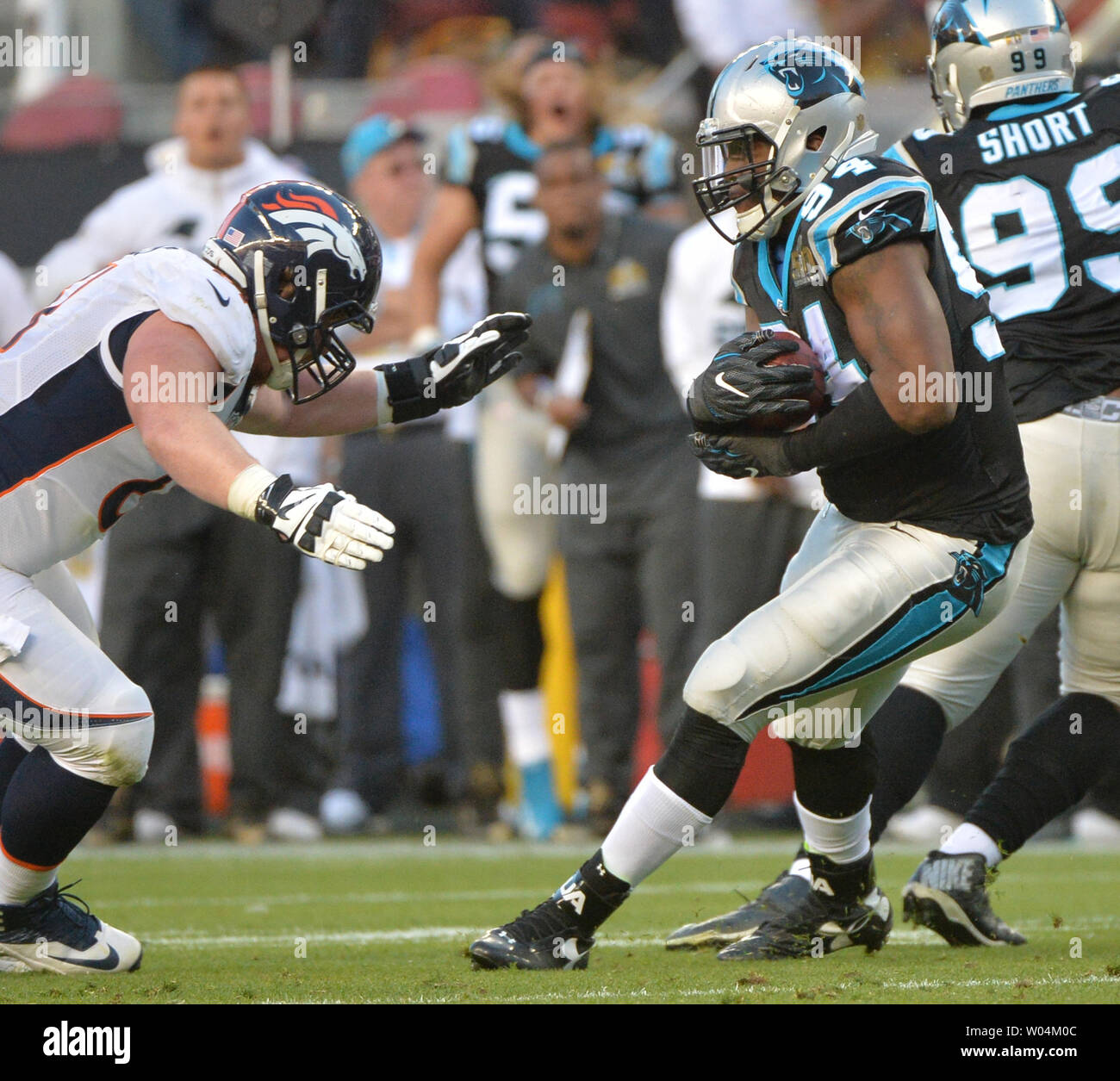 Carolina Panthers Kony Ealy (R) runs an intercepted pass from Denver Broncos Peyton Manning in the second quarter of Super Bowl 50 in Santa Clara, California on February 7, 2016.      Photo by Kevin Dietsch/UPI Stock Photo