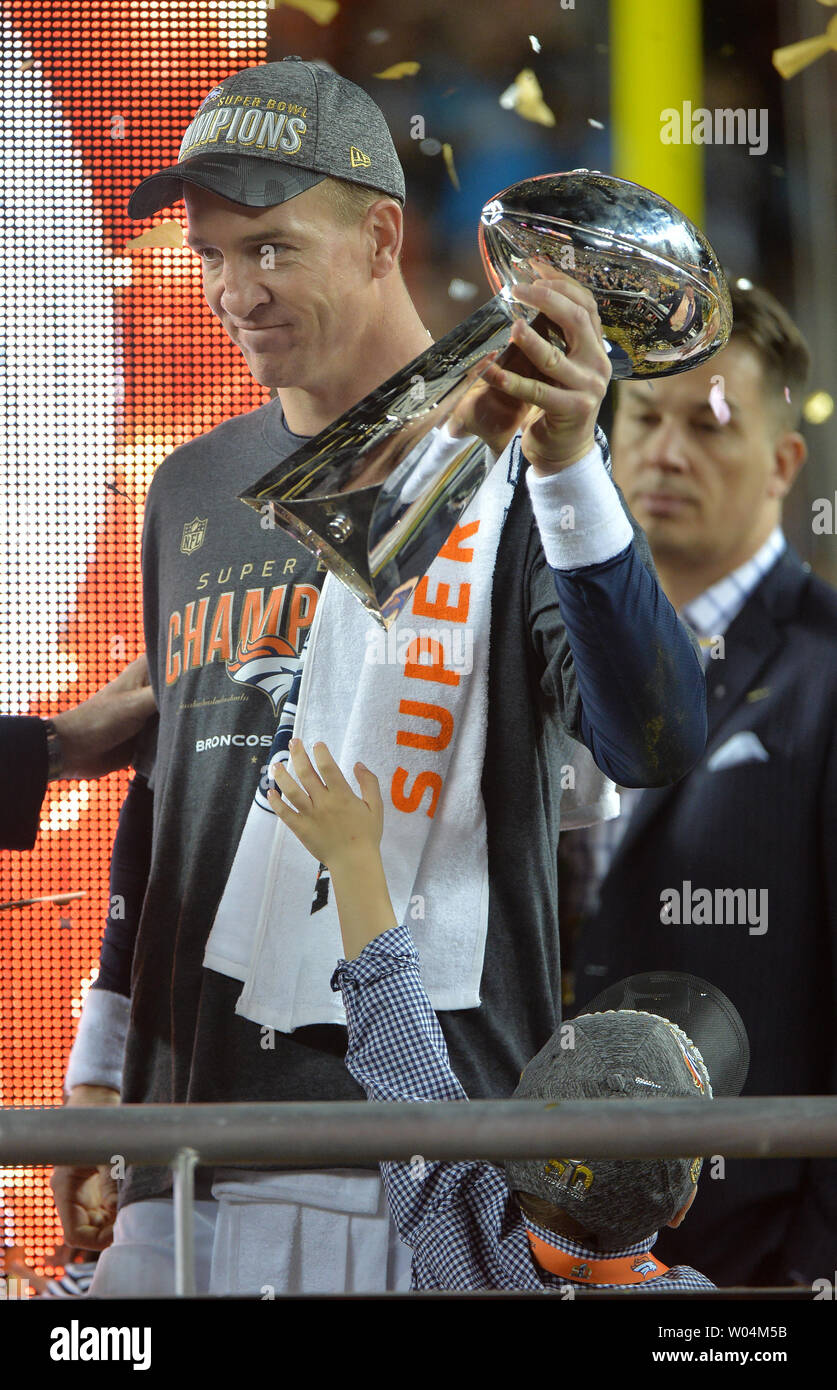 Denver Broncos QB Peyton Manning's son reaches for the Lombardi trophy at Super  Bowl 50 at Levi's Stadium in Santa Clara, California on February 7, 2016.  Denver wins Super Bowl 50 defeating