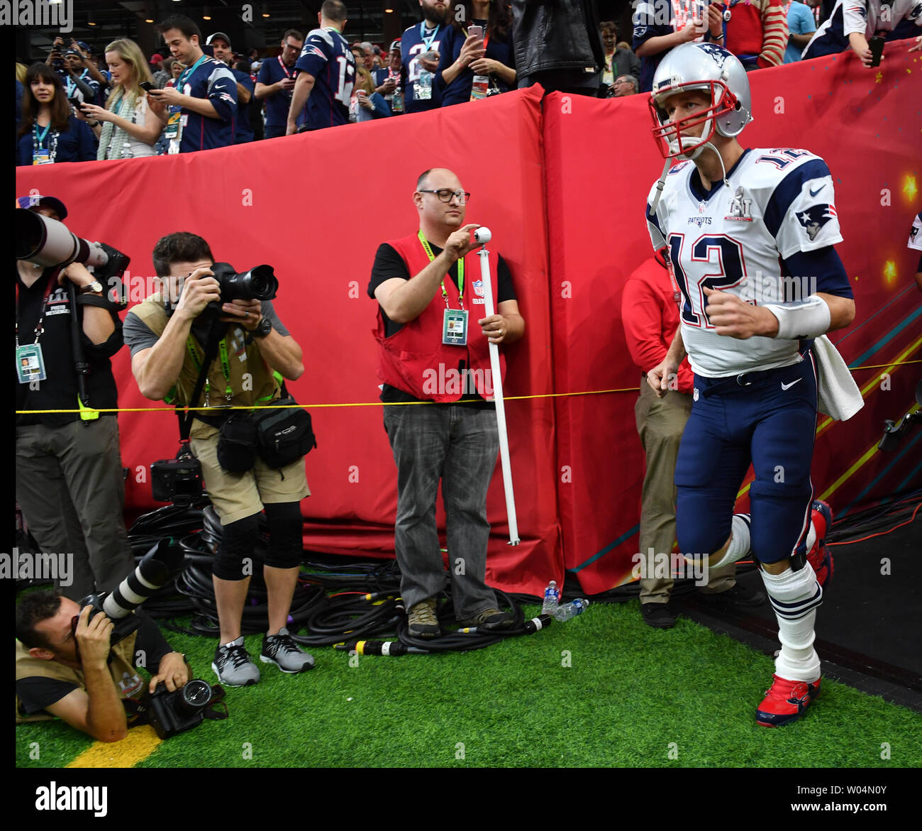 New England Patriots quarterback Tom Brady (L) and center David Andrews  celebrate after Super Bowl LI at NRG Stadiu…