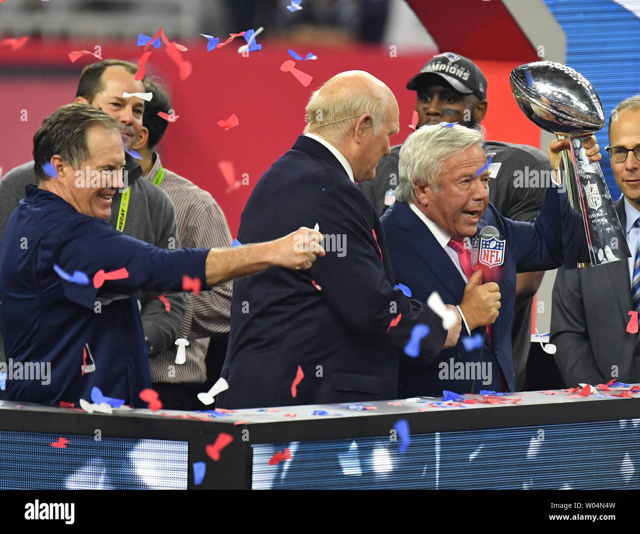 SLP2000012318 - 23 JANUARY 200 - ST. LOUIS, MISSOURI, USA: St. Louis Rams  wide receiver Ricky Proehl runs around the Trans World Dome with the Vince  Lombardi Trophy after defeating the Tampa