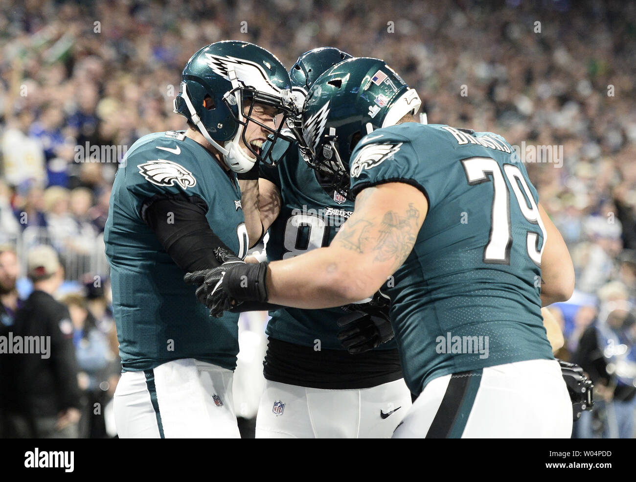 Philadelphia Eagles quarterback Nick Foles (#9) and his daughter Lily James  Foles celebrate with the Vince Lombardi trophy after defeating the New  England Patriots 41- 33 at Super Bowl LII between the