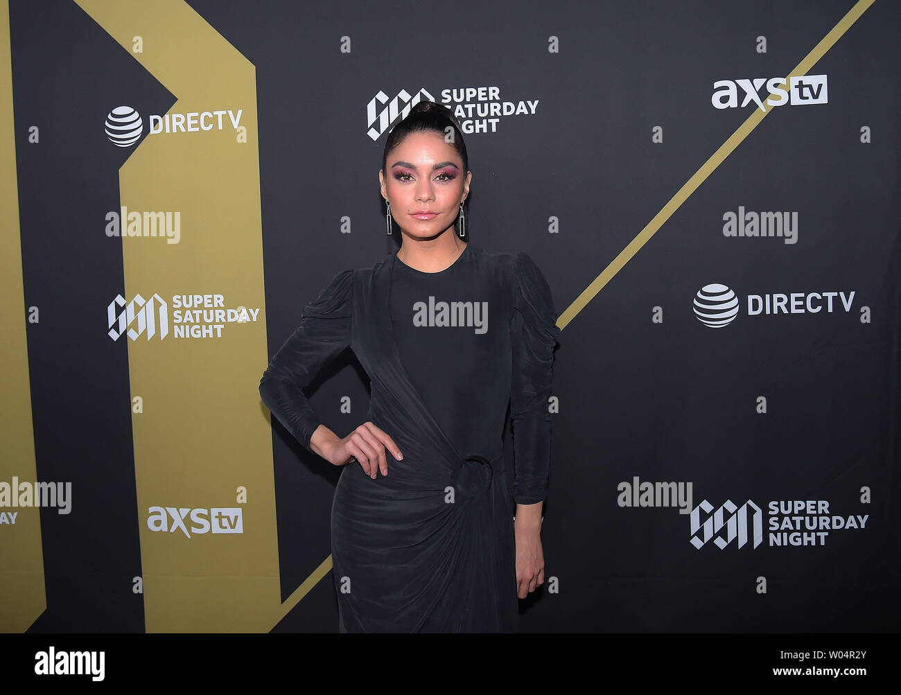 Vanessa Hudgens arrives at the DIRECTV Super Saturday Night red carpet