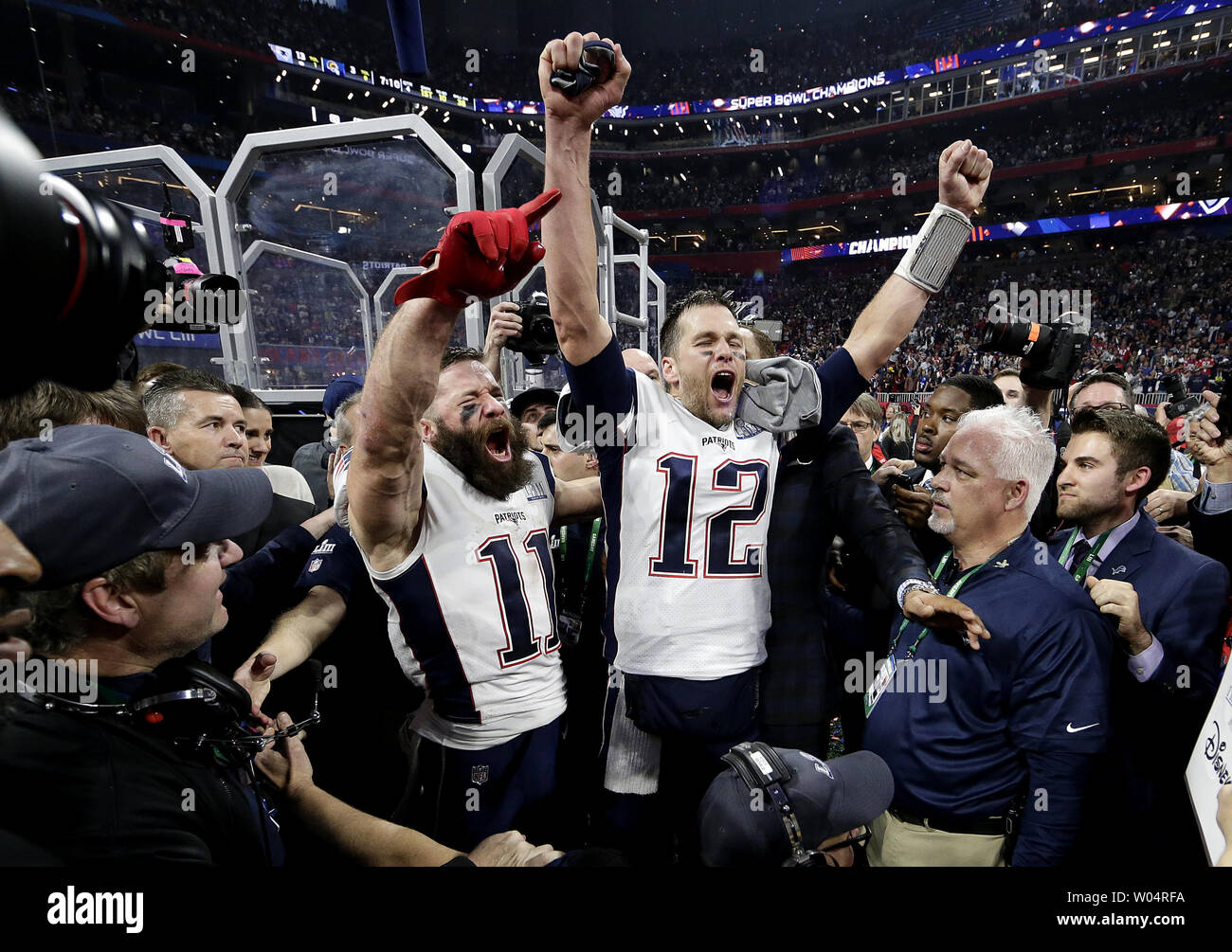 New England Patriots wide receiver Julian Edelman and Tom Brady celebrate  after the game against the Los Angeles Rams at Super Bowl LIII at  Mercedes-Benz Stadium on February 3, 2019 in Atlanta.