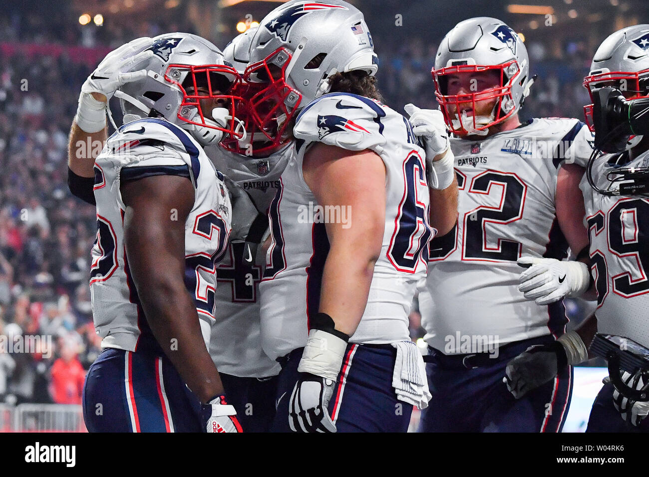 https://c8.alamy.com/comp/W04RK6/new-england-patriots-running-back-sony-michel-26-is-congratulated-by-teammates-after-a-two-yard-touchdown-carry-in-the-fourth-quarter-of-super-bowl-liii-against-the-los-angeles-rams-at-mercedes-benz-stadium-on-february-3-2019-in-atlanta-photo-by-kevin-dietschupi-W04RK6.jpg