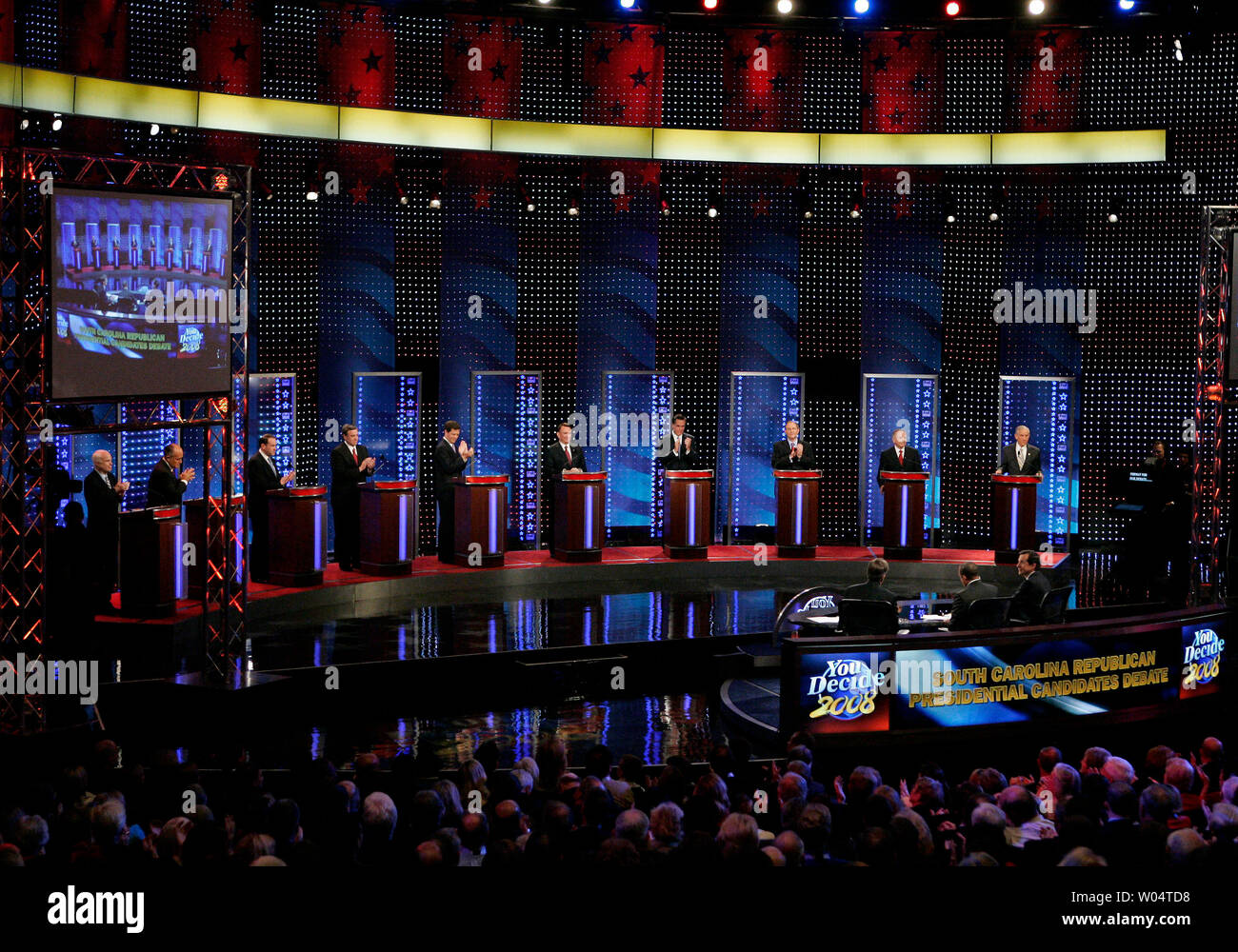 The Republican presidential candidates line the stage in the ...
