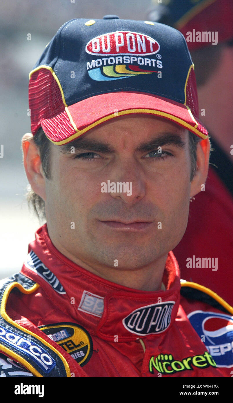 Race car driver Jeff Gordon awaits NASCAR Dodge Charger 500 qualifying