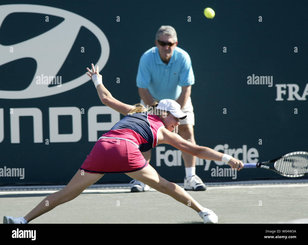Vera Zvonareva of Russia stretches to hit a backhand shot on the baseline against Michaella Krajicek of the Netherlands in the quarterfinals of the Family Circle Cup tennis tournament in Charleston, South Carolina on April 13, 2007. Zvonareva won the match 6-1, 7-5. (UPI Photo/Nell Redmond) Stock Photo
