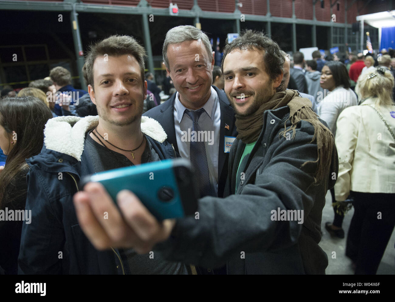 Democratic presidential candidate Martin O'Malley takes a selfie photo with attendees at the James Clyburn Fish Fry in Charleston, South Carolina on January 17, 2106. Photo by Kevin Dietsch/UPI Stock Photo