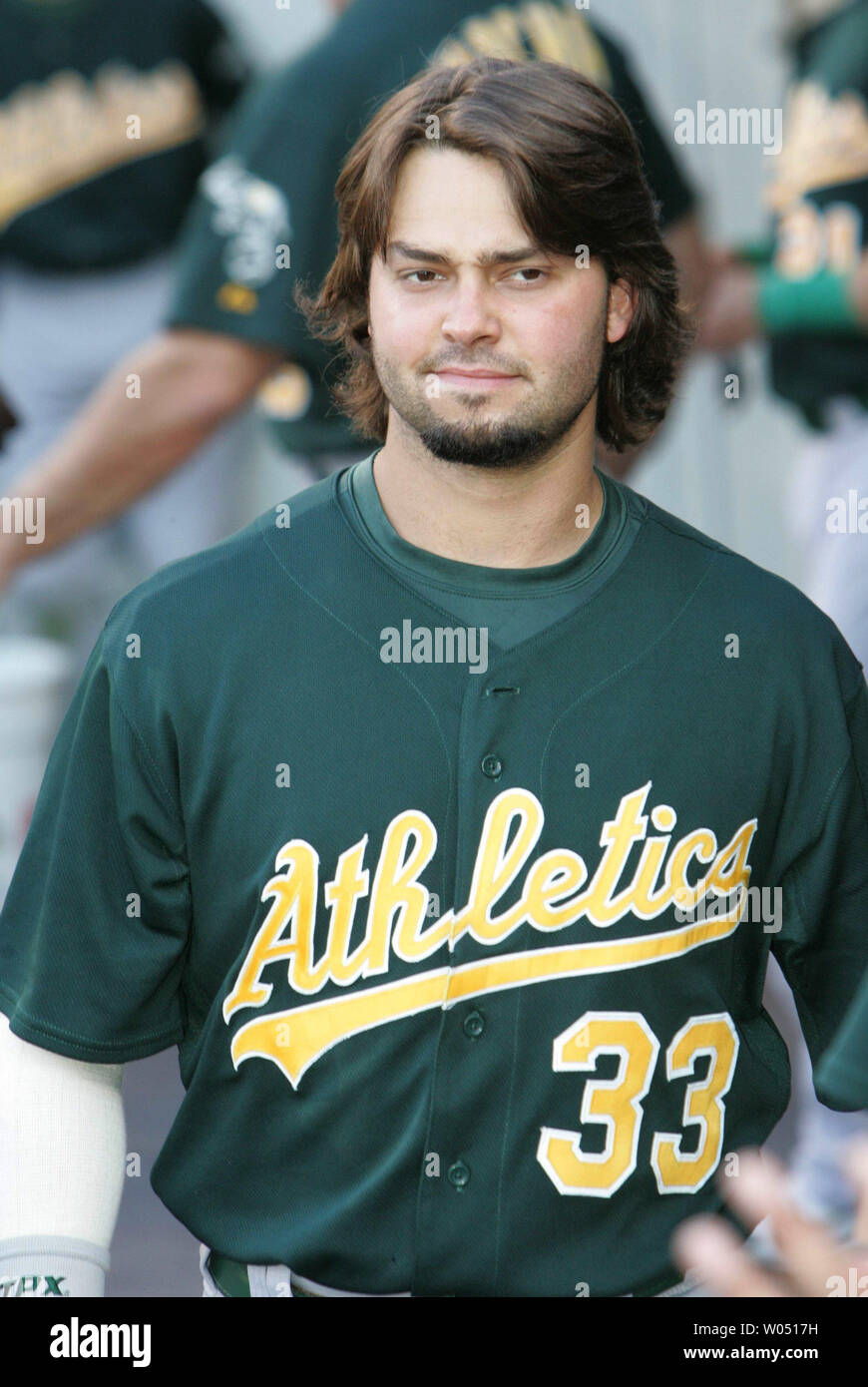 Oakland Athletics Nick Swisher gets his haircut by his dad Steve before the  Athletics game against the San Francisco Giants at McAfee Coliseum on  Saturday May 19, 2007. Swisher cut his hair