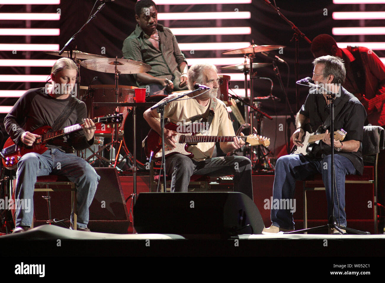 Derek Trucks, drummer Steve Jordan, J.J. Cale, Eric Clapton, and Willie Weeks (L-R) perform in concert at the ipayOne Center in San Diego on March 15, 2007.   (UPI Photo/Roger Williams) Stock Photo