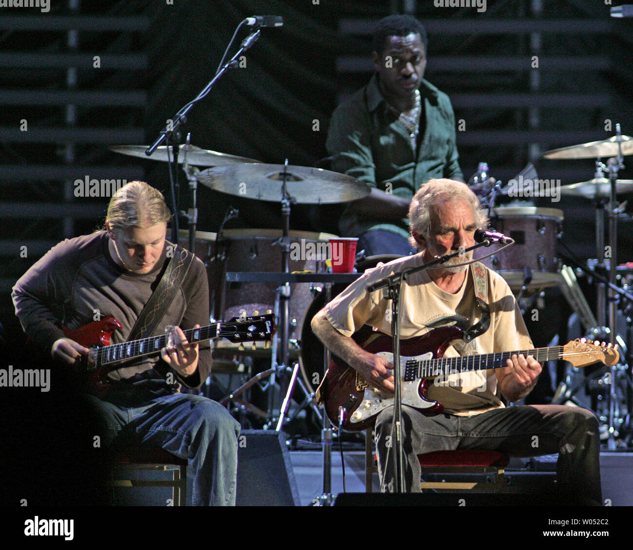 Derek Trucks, drummer Steve Jordan, and J.J. Cale (L-R) perform in concert with Eric Clapton at the ipayOne Center in San Diego on March 15, 2007.   (UPI Photo/Roger Williams) Stock Photo