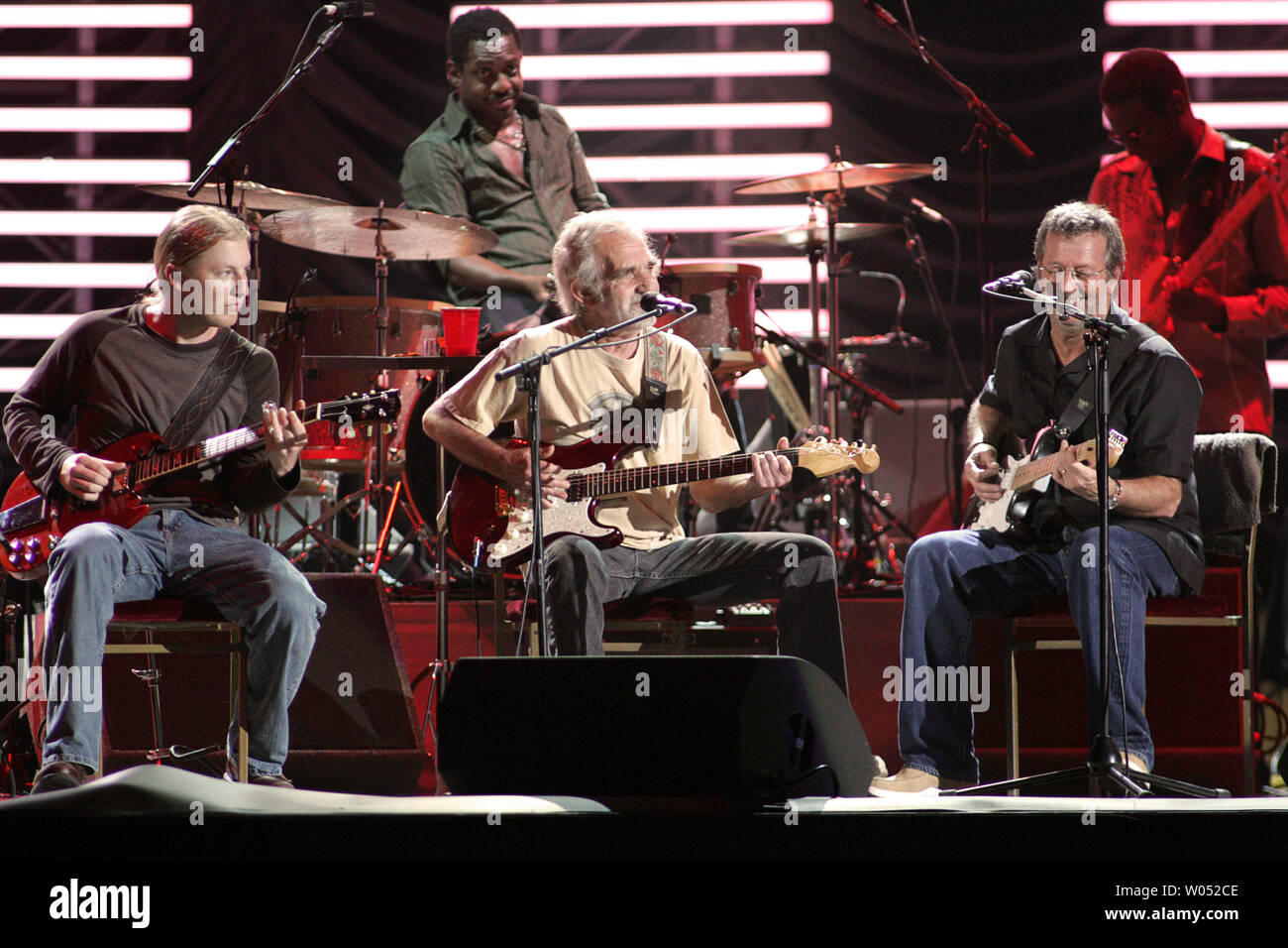 Derek Trucks, drummer Steve Jordan, J.J. Cale, Eric Clapton, and Willie Weeks (L-R) perform in concert at the ipayOne Center in San Diego on March 15, 2007.   (UPI Photo/Roger Williams) Stock Photo