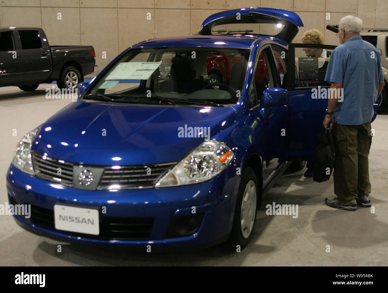 A Nissan Versa 1 8s Hb Is On Display At The 2009 San Diego