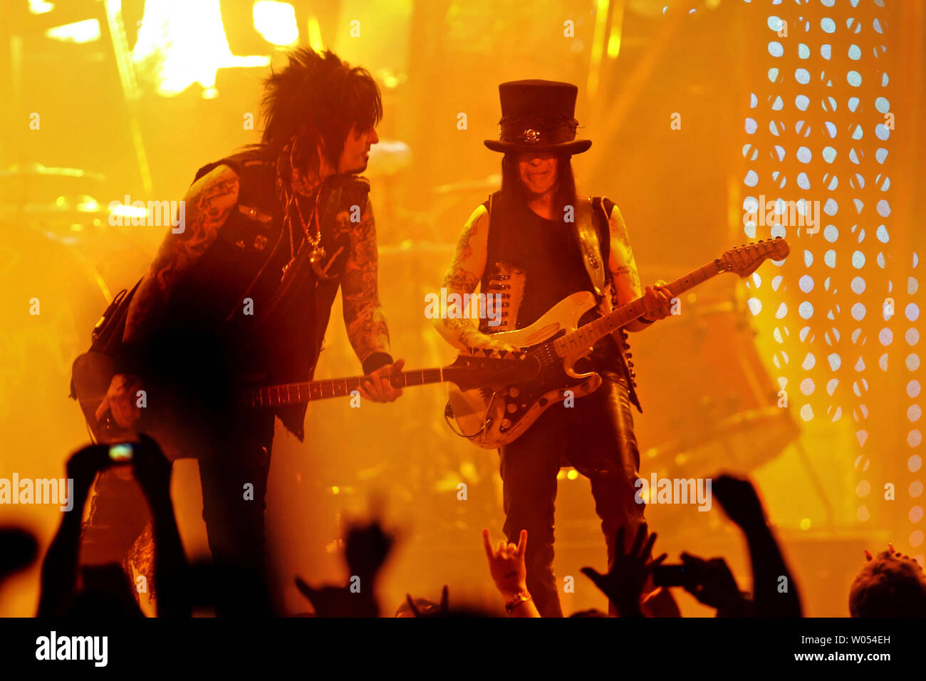 Nikki Sixx (L) and Mick Mars of Motley Crue perform in concert at San Diego State University's Cox Arena on February 2, 2009, kicking off the group's 'Saints of Los Angeles' Tour. The tour celebrates Motley Crue's album of the same name, their first studio album in over a decade to feature the original members.    (UPI Photo/Roger Williams) Stock Photo