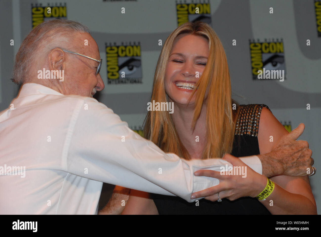 Comics creator Stan Lee greets actress Natasha Henstridge at the 40th annual Comic-Con International, the largest comic book and pop culture event in North America, at the San Diego Convention Center on July 23, 2009. (UPI Photo/Earl Cryer) Stock Photo