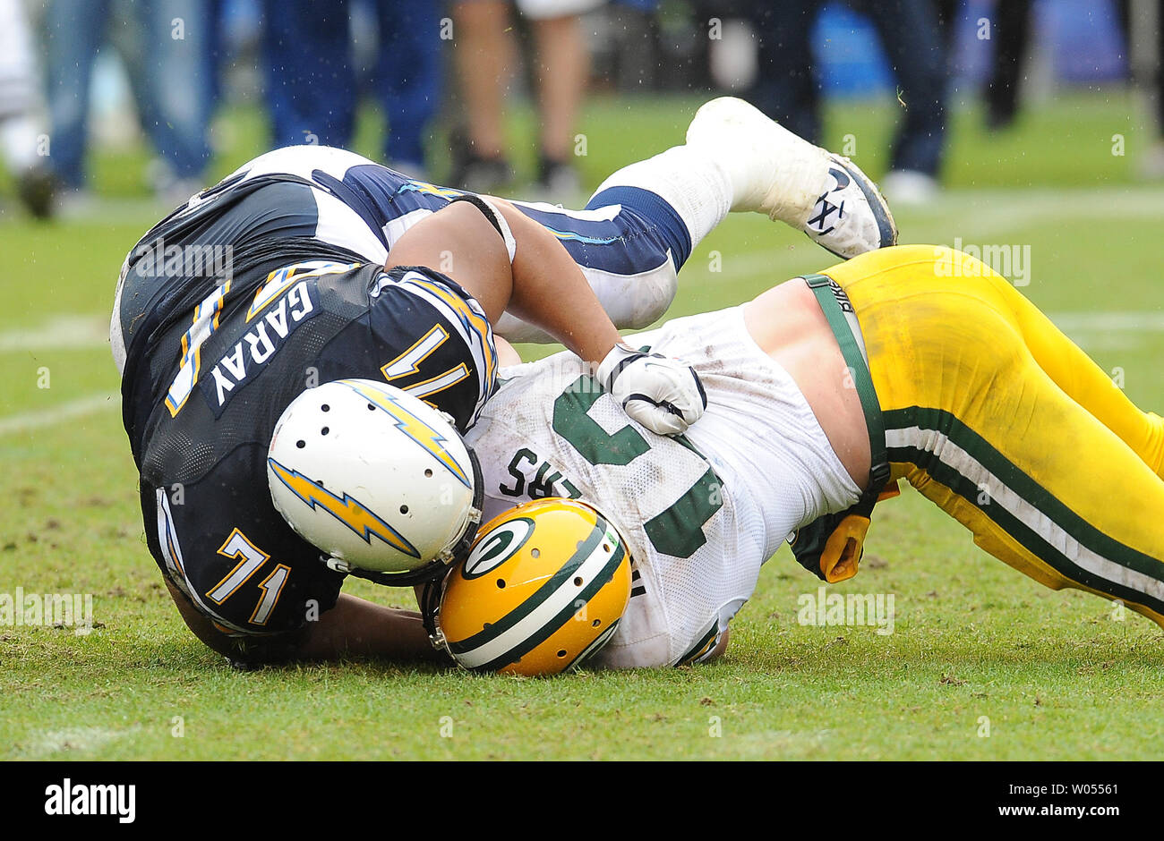 Green Bay Packers quarterback Aaron Rodgers (12) is sacked by San