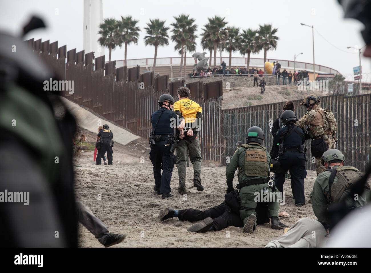 Border patrol agents and Department of Homeland Security police arrest