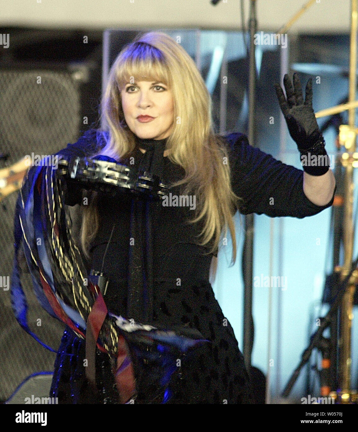 Stevie Nicks of Fleetwood Mac plays the tambourine during their performance  at the White River Amphitheatre in Auburn, WA., on July 1, 2004. This is  the 25th stop of their 35 city