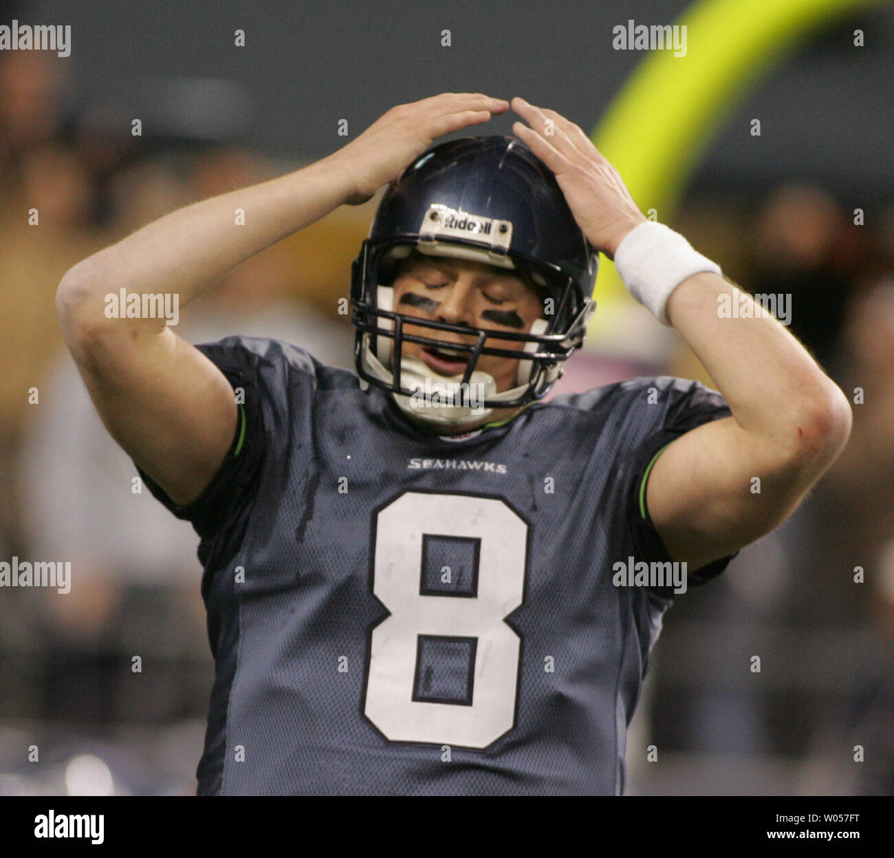 Seattle Seahawks QB Matt Hasselbeck puts his hands to his helmet realizing  the game is won following a 4th quarter TD in the NFC Championship at Qwest  Field in Seattle on January