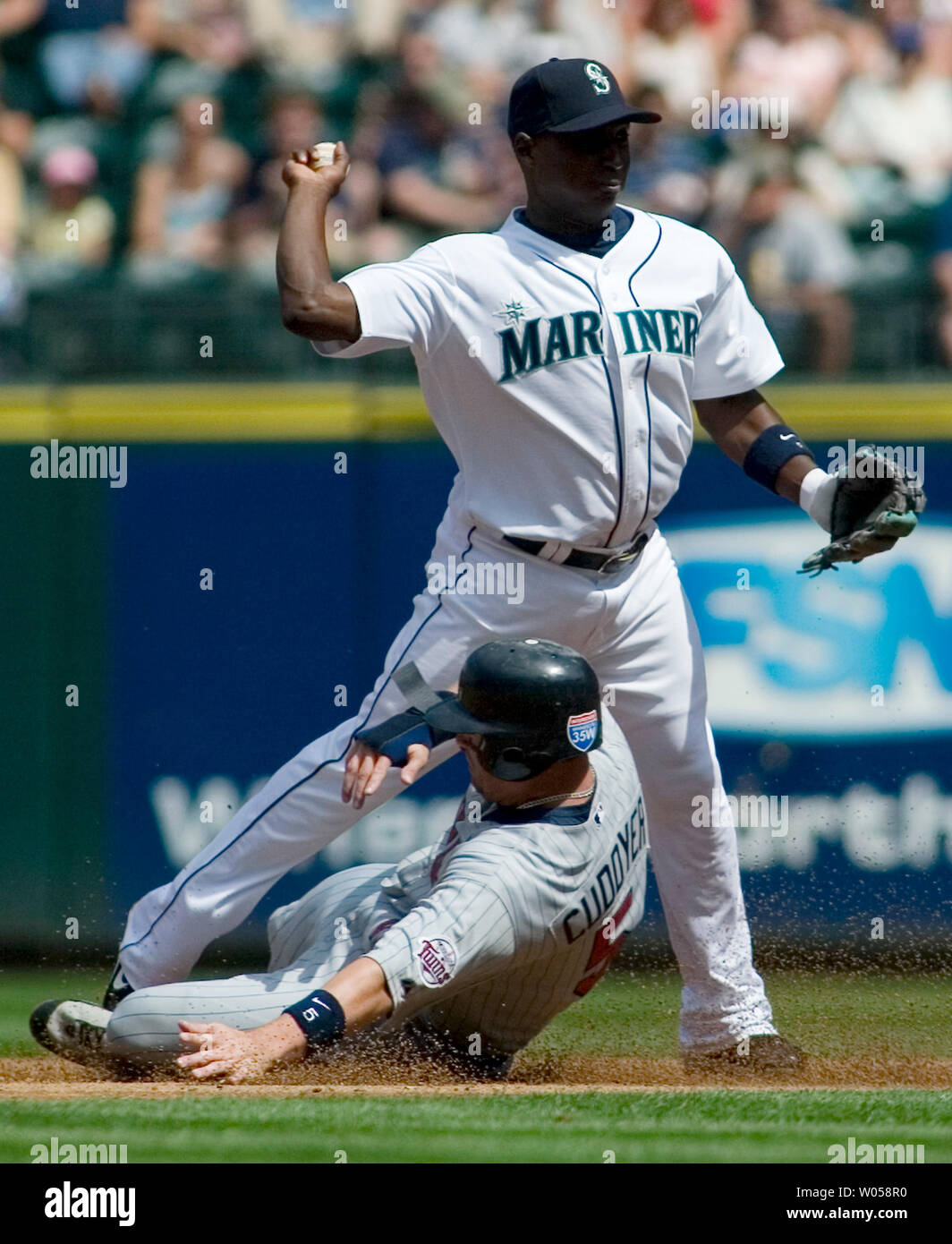 Seattle Mariners' Adrian Beltre watches his line drive caught by Texas  Rangers second baseman Ian Kinsler in the third inning at Safeco Field in  Seattle April 5, 2008. The Mariners beat the