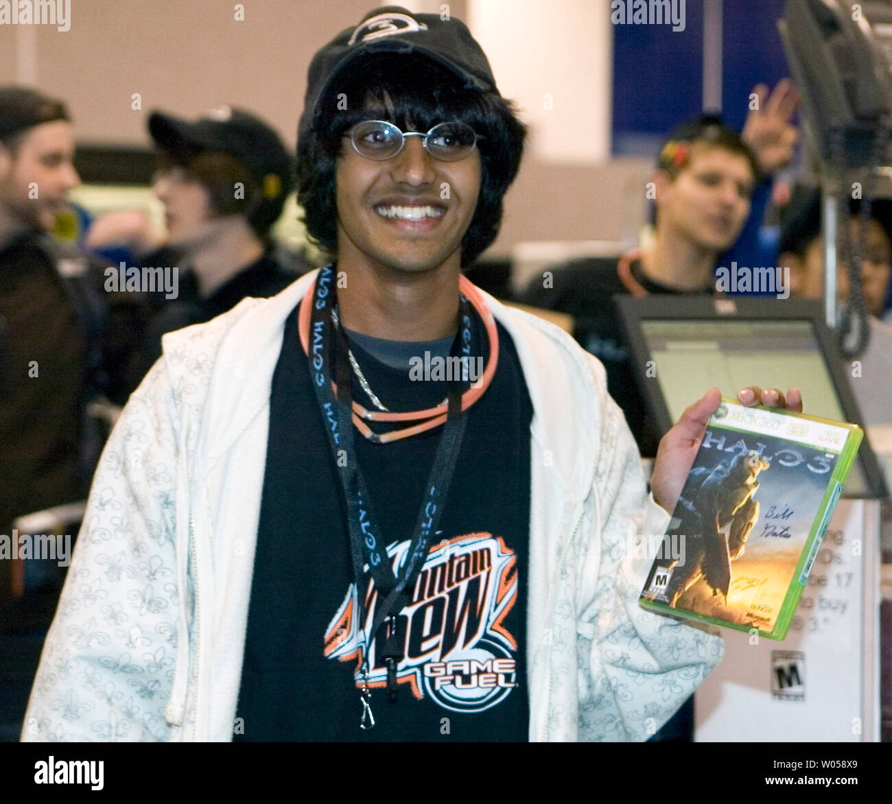 Ritesh David holds his Bill Gates autographed copy of Halo3 during the global release at Best Buy in Bellevue, Washington on September 25, 2007