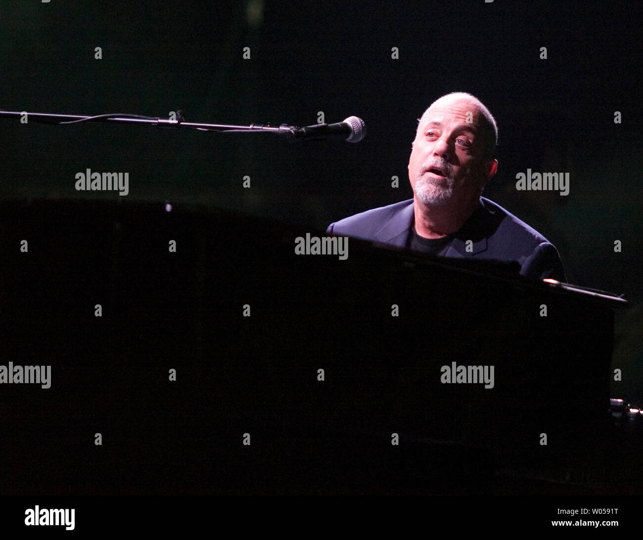 Billy Joel performs 'Angry Young Man' at the Key Arena in Seattle on November 8, 2007. Seattle was the 4th stop on a tour of 15 cities throughout Canada, United States and Mexico.  (UPI Photo/Jim Bryant) Stock Photo