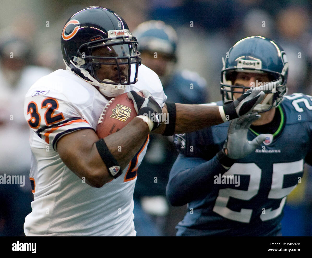 Chicago Bears running back Cedric Benson, front, is congratulated