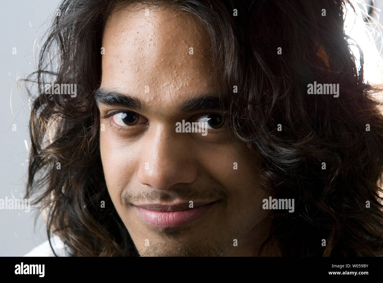 Singer Sanjaya Malakar is photographed in a studio setting on May 18, 2008 in Seattle. Malakar was a finalist on the sixth season of American Idol where he gained national attention by advancing to 7th place with public votes despite being badly received by the show's judges. (UPI Photo/Jim Bryant) Stock Photo