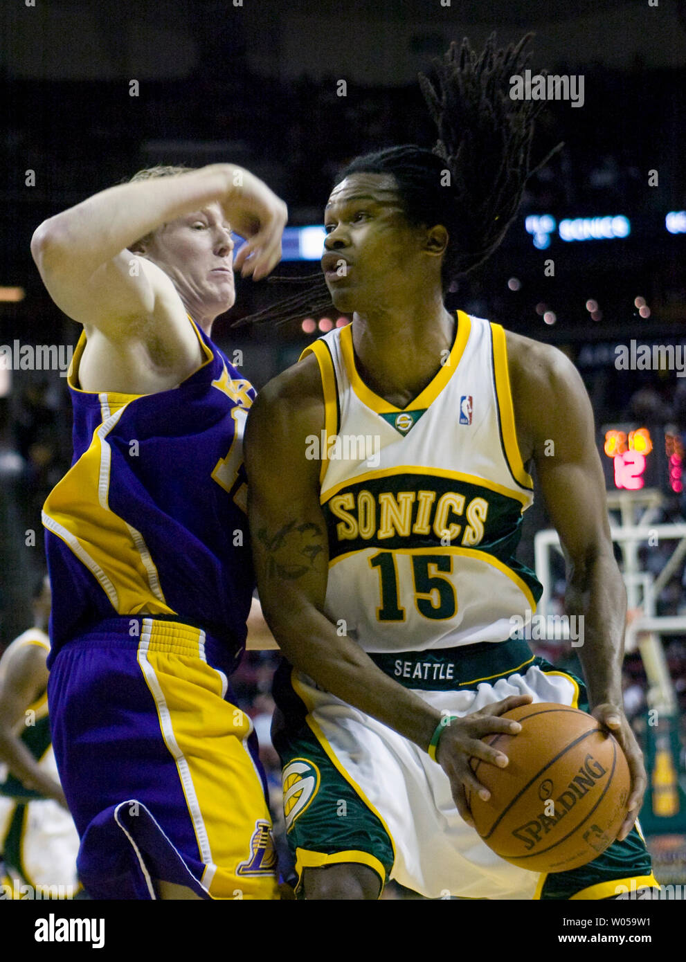 Seattle SuperSonics' Mickael Gelable, of France, (R) looks for an opening  against LA Lakers' Coby Karl during the second half at the Key Arena in  Seattle on February 24, 2008. Gelable scored