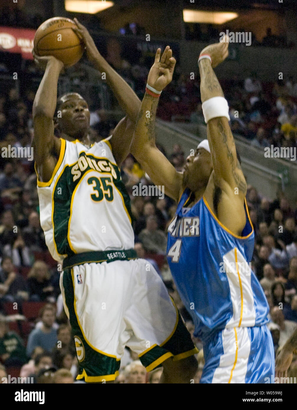 The Seattle SuperSonics Kevin Durant (35) drives around Minnesota  Timberwolves defender Ryan Gomes (8) during second half action. The Sonics  defeated the Timberwolves, 111-108, at the Target Center in Minneapolis,  Minnesota, Sunday