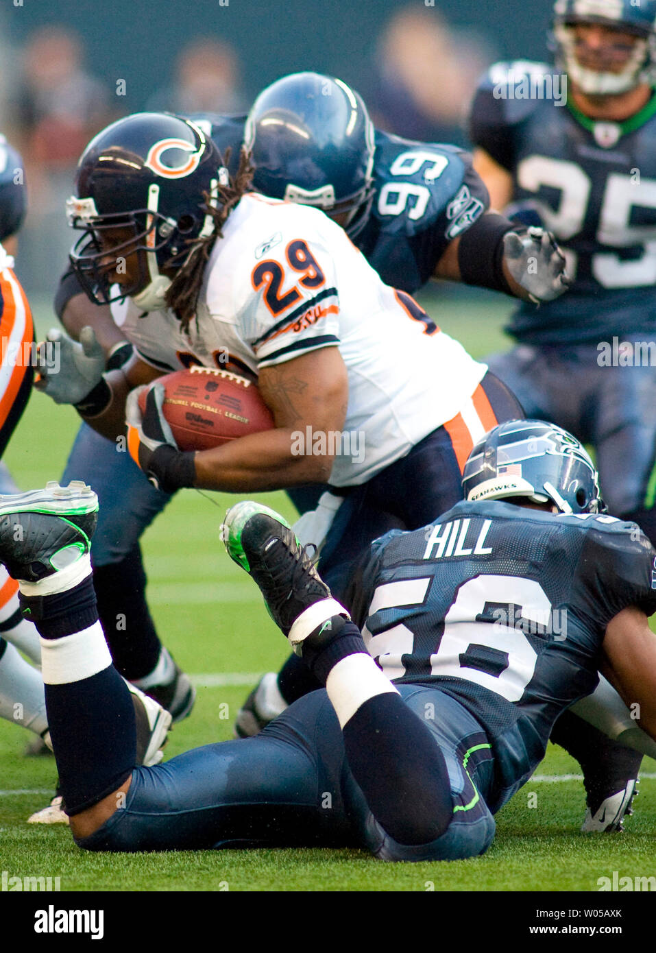 Chicago Bears running back Adrian Peterson (29) runs for a gain of five  yards during the first quarter against the New Orleans Saints at Soldier  Field in Chicago on December 30, 2007. (