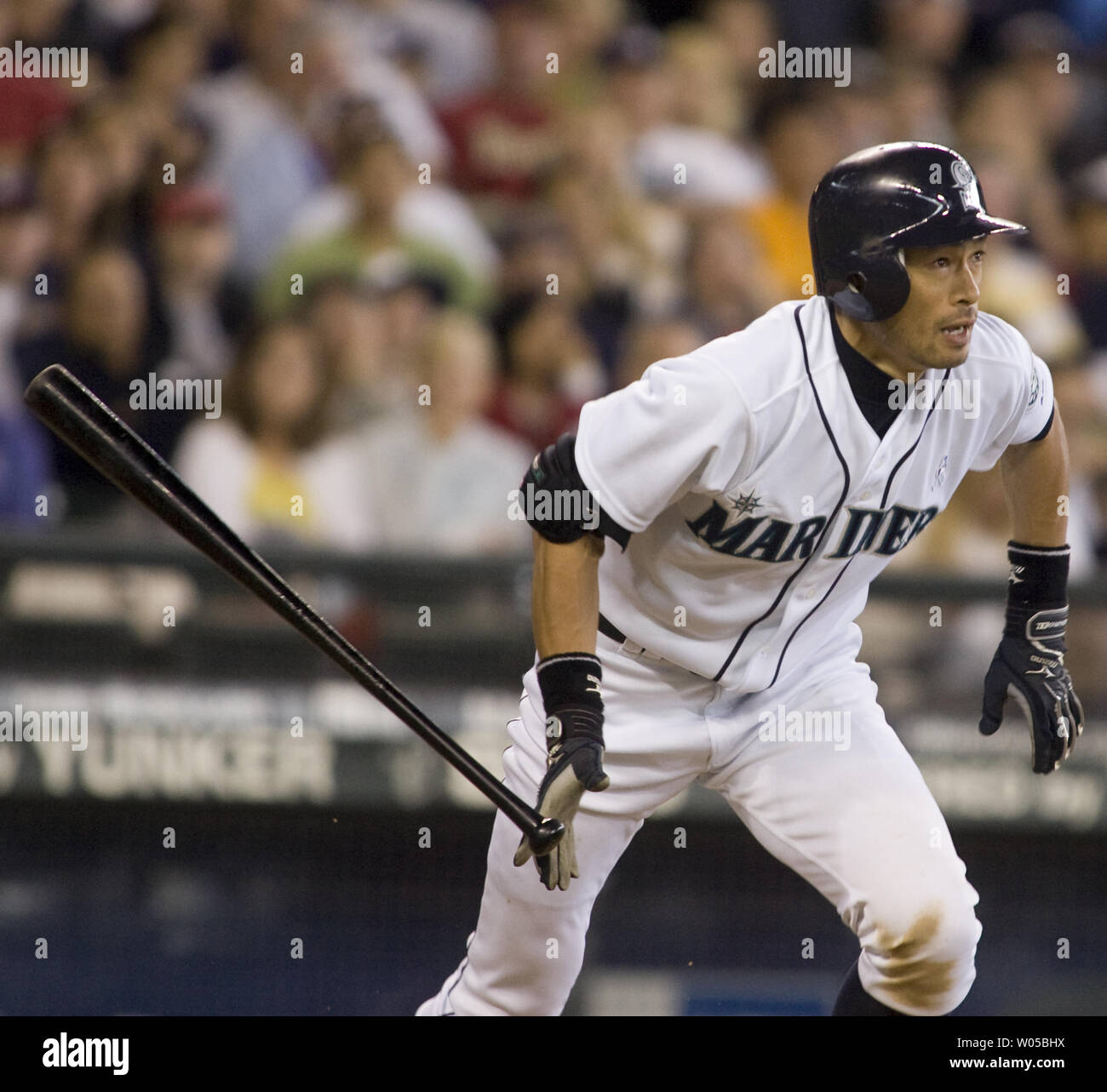 Seattle Mariners'  Ichiro Suzuki watches his single down the first base line against Arizona Diamondbacks in the fifth inning  at SAFECO Field in Seattle on June 21, 2009. Suzuki recorded his 1,900th major league hit on a 70-foot roller down the first-base line. He sheepishly acknowledged the crowd with a tip of the cap when the milestone was displayed on the scoreboard. The Mariners beat the Diamondbacks 3-2.  (UPI Photo/Jim Bryant) Stock Photo